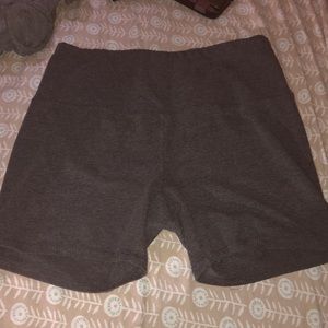 Medium sized, gray spandex shorts.